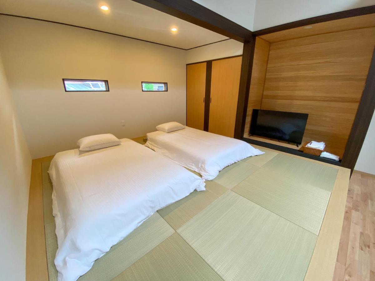Villa Miyako 源泉かけ流し客室温泉ヴィラ みやこ別邸 Goto Buitenkant foto